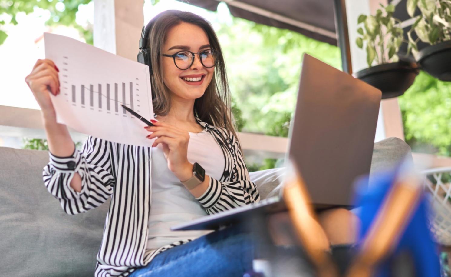 Person working on financial documentation with coffee
